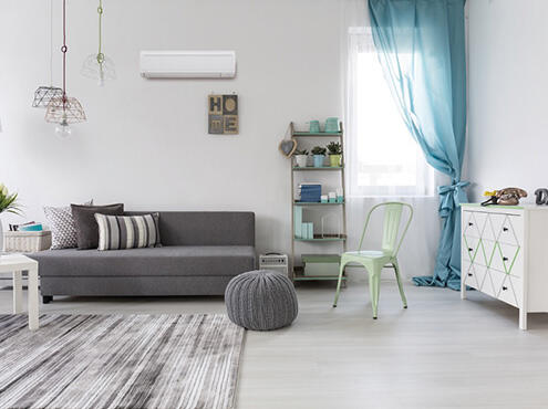 Living room image with wall air conditioning cooling unit